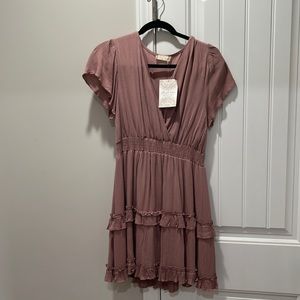 Dress from Altar’d State it is a medium.